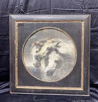 Front view of the framed antique horse art depicting three white horse heads tightly grouped in a circular format within a square frame.
