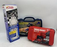 Photo of the Kidde Auto/Marine Fire Extinguisher, blue DataShark Satellite TV & Cable Modem Kit case, and red Firestone Roadside Emergency 30-Pc Set case.