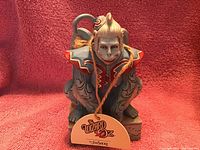 Hand-painted ceramic Winged Monkey figurine from The Wizard of Oz by Jim Shore with original tag visible.