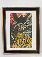 Full view of the framed Russian movie poster depicting 'Man with a Movie Camera' theme with the central human figure design.