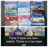 Close-up view of the 5 new sealed VHS tapes with Titanic as a two-tape set clearly visible.