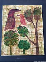 Full view of unframed board on dark background