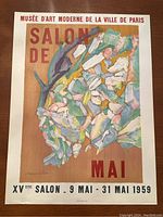 Full view of poster on wooden surface