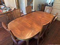 Full set extended with six chairs in dining room view