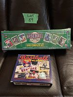 Front view of the 1990 Upper Deck Baseball card complete set sealed box and the 2007 National Baseball Hall of Fame daily calendar unopened box.