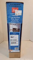 Photo showing unopened box of US Window & Door cordless 2 inch faux wood blind measuring 22.5" W x 36" H in white color.
