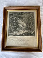 Full view of framed copperplate engraving showing deer in forest landscape with text below.