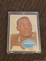 Front of Jimmy Brown Cleveland Browns football card showing player portrait and name in protective case