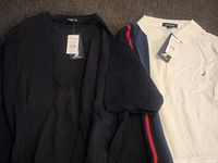 Black and white Nautica shirts with tags, showing included short sleeve shirts.