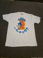 Full view of front of white t-shirt showing Sonic 2 design and text.