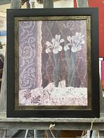 Full view of the framed floral print showing the artwork and frame details.