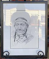 Framed pencil sketch showing full artwork and frame with matting.