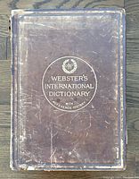 Front cover view showing title and surface wear