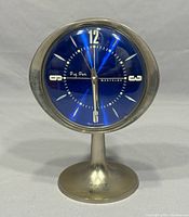 Front view of the vintage Westclox Big Ben Space Age clock showing the blue dial and silver pedestal base.