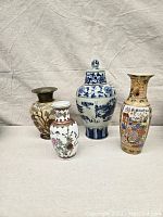 Photo showing all four ginger jars and vases in the collection, highlighting size and color variety