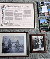 Overall photo of the Canadian Bill of Rights framed print, vintage photo, Tower Bridge print, and three booklets showing all items included in lot.