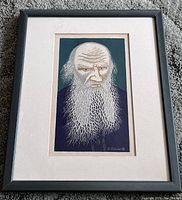 Full front view of the framed portrait print of Leo Tolstoy by Alexandre Alexeieff showing the entire frame, matting, and print.