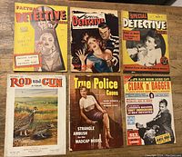 Front cover shot of all 6 pulp magazines showing crime, detective, and adventure cover art.
