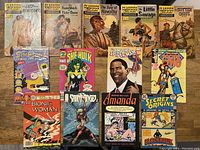 Top-down view of all comic book front covers in the lot, showing titles and artwork.