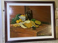 Framed original still life painting showing a dead pheasant, squash, lemons, bottles and bowl on a wooden surface with dark brown background. Signed by artist Ciza Brown in 1975.