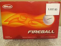 Box of Wilson Fireball golf balls showing the front with flame design and product name Fireball, indicating 15 golf balls total.