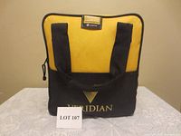 Front view of yellow and black Veridian branded fabric carry bag containing roadside emergency kit items.