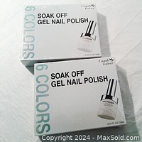 Two unopened sets of Candy Lover soak off gel nail polish in white box packaging, each containing 6 colors.