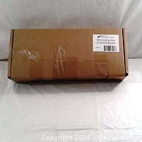 Brown cardboard product box labeled 'Global Tone' with product label including model number #03117 and specifications for double desktop mount monitor bracket.