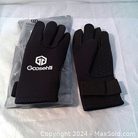 Pair of Goosehill neoprene water sport gloves laid out flat showing front and back sides with packaging visible.
