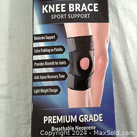Photo of the knee brace packaging showing product features including moderate support, extra patella padding, warmth provision, injury recovery aid, and lightweight design. Material is breathable neoprene.