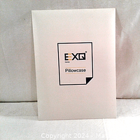 Packaged EXQ pillowcase set in white box with minimal branding.