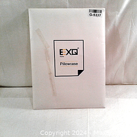 Packaged EXQ satin pillow case box, white packaging with black text.