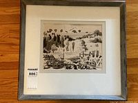 Framed ink wash landscape artwork with visible mat and frame, mounted under glass.