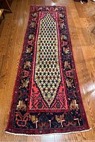 Full length view of runner on hardwood floor