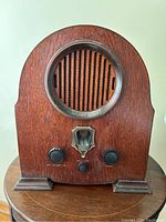 Front detail showing speaker grill, control knobs, and vintage Prosonic badge.