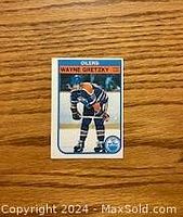 Front of 1982-83 O-Pee-Chee Wayne Gretzky card #106 showing player image and details.