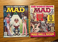 Front covers of two vintage MAD magazines, one featuring Miami Vice and Murder She Wrote, the other a Winter 1984 Super Special