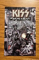 Front cover of Kiss Psycho Circus #1 comic book showing characters and title.