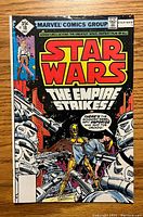 Front cover of Star Wars comic book issue #18 showing title, artwork of characters and Star Wars logo.