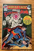 Front cover of the comic book showing Superman and Batman with a villain and speech bubbles, indicating a dramatic scene. Published May 1971 by DC Comics, priced 15 cents.