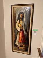 Full view of framed oil painting on board hung on wall