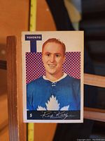 Front side of the 1961-62 Red Kelly Parkhurst hockey card showing player portrait, team logo, and card number.