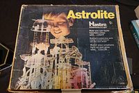 Box showing product name Astrolite by Hasbro and image of assembled futuristic structure.