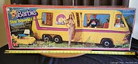Full length of the original box showing the Star Traveler MotorHome, Barbie and Ken dolls, with a tape measure indicating length near 3 feet.