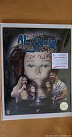 Full view of the signed Al Snow photo showing the image, autograph, and hologram sticker.