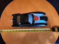 Top-down view showing overall length and red circular detail on roof