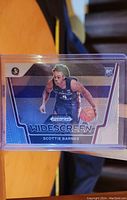 Front of Scottie Barnes rookie card showing the player in basketball uniform with Widescreen design.