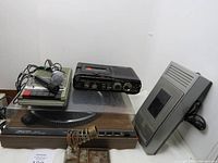 Overview of entire lot showing turntable, recorder, rewinder, microphone and soldering iron stand