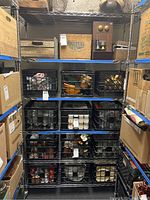 Front view of the full six-tier shelf unit loaded with crates (contents not included)