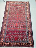 Full top view of rug showing overall pattern, field color and border